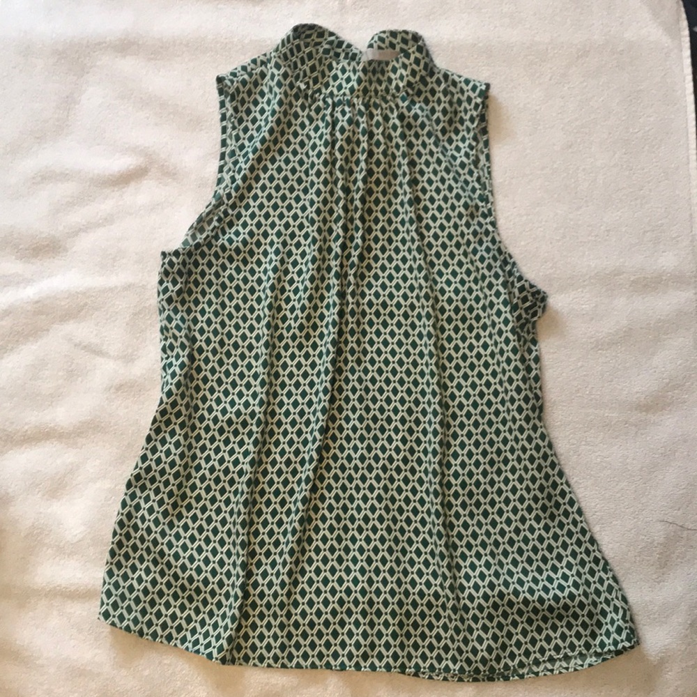 H&M New elegant sleeveless blouse